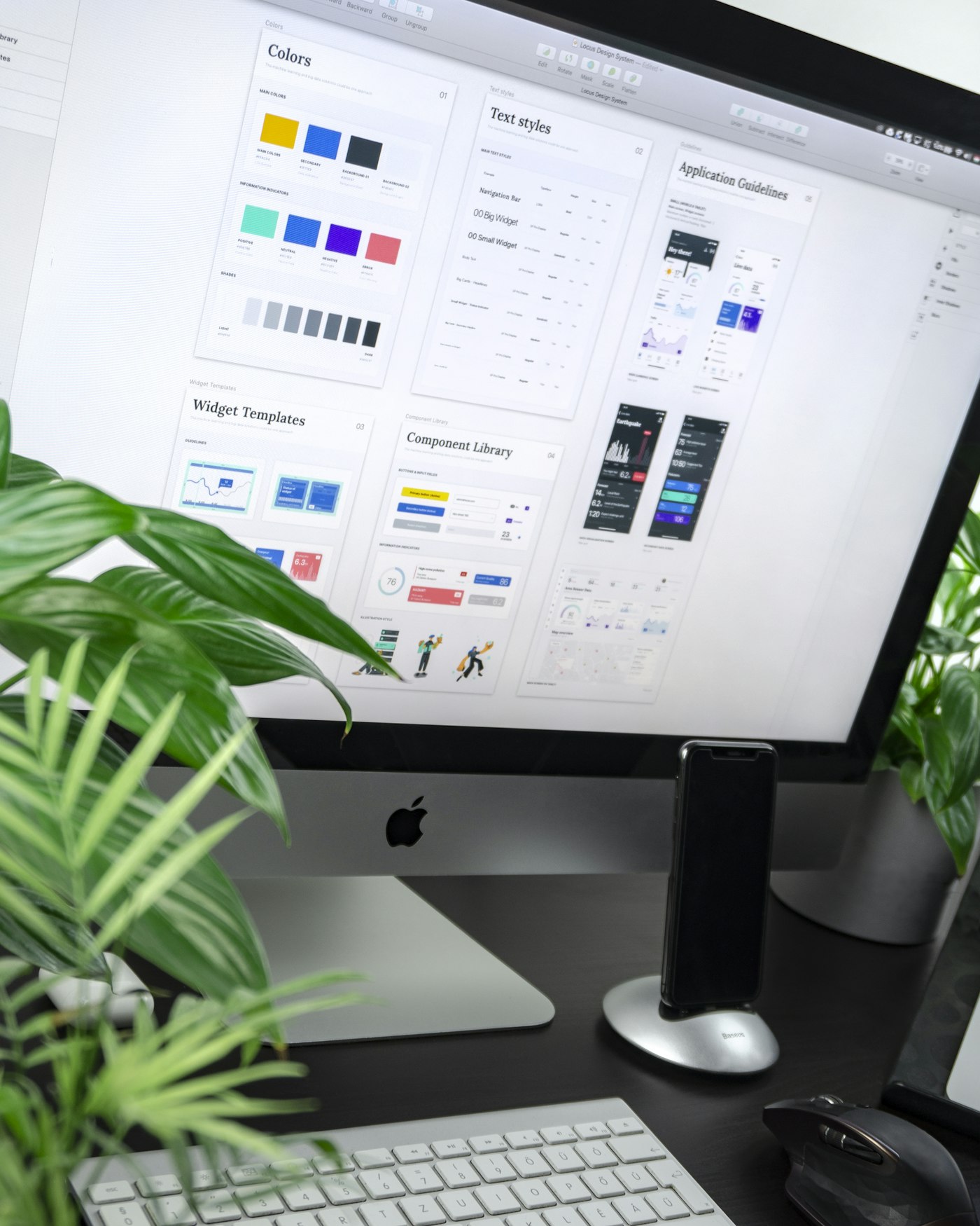 Creative workspace with design materials and color swatches
