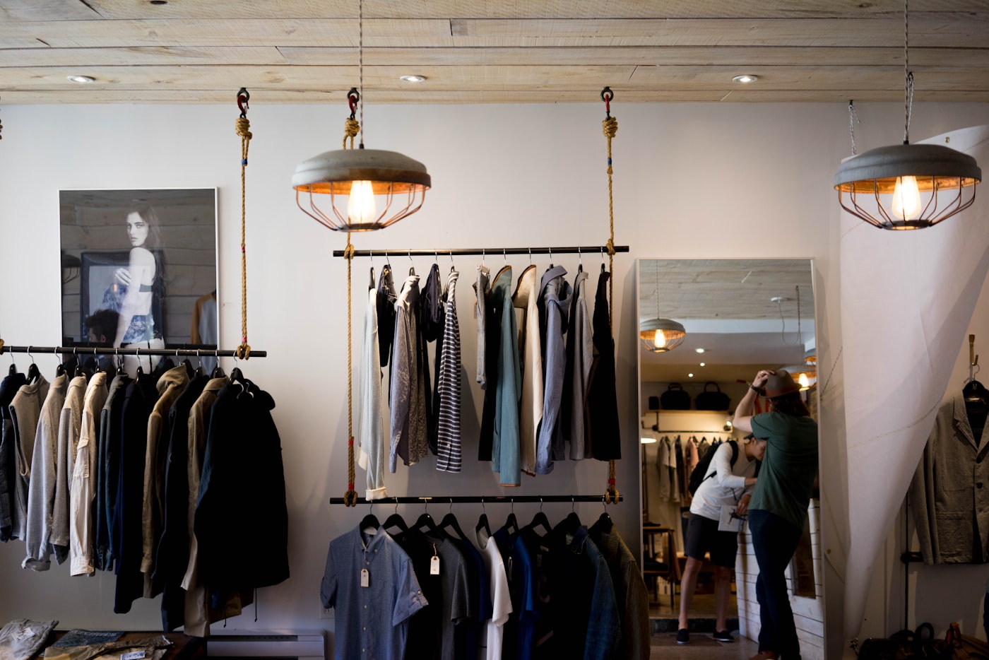 Clothing racks in a curated retail boutique